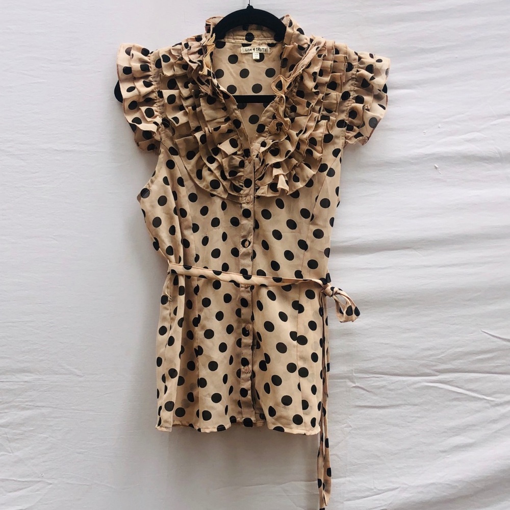 Sheer, polka dotted blouse with ruffles